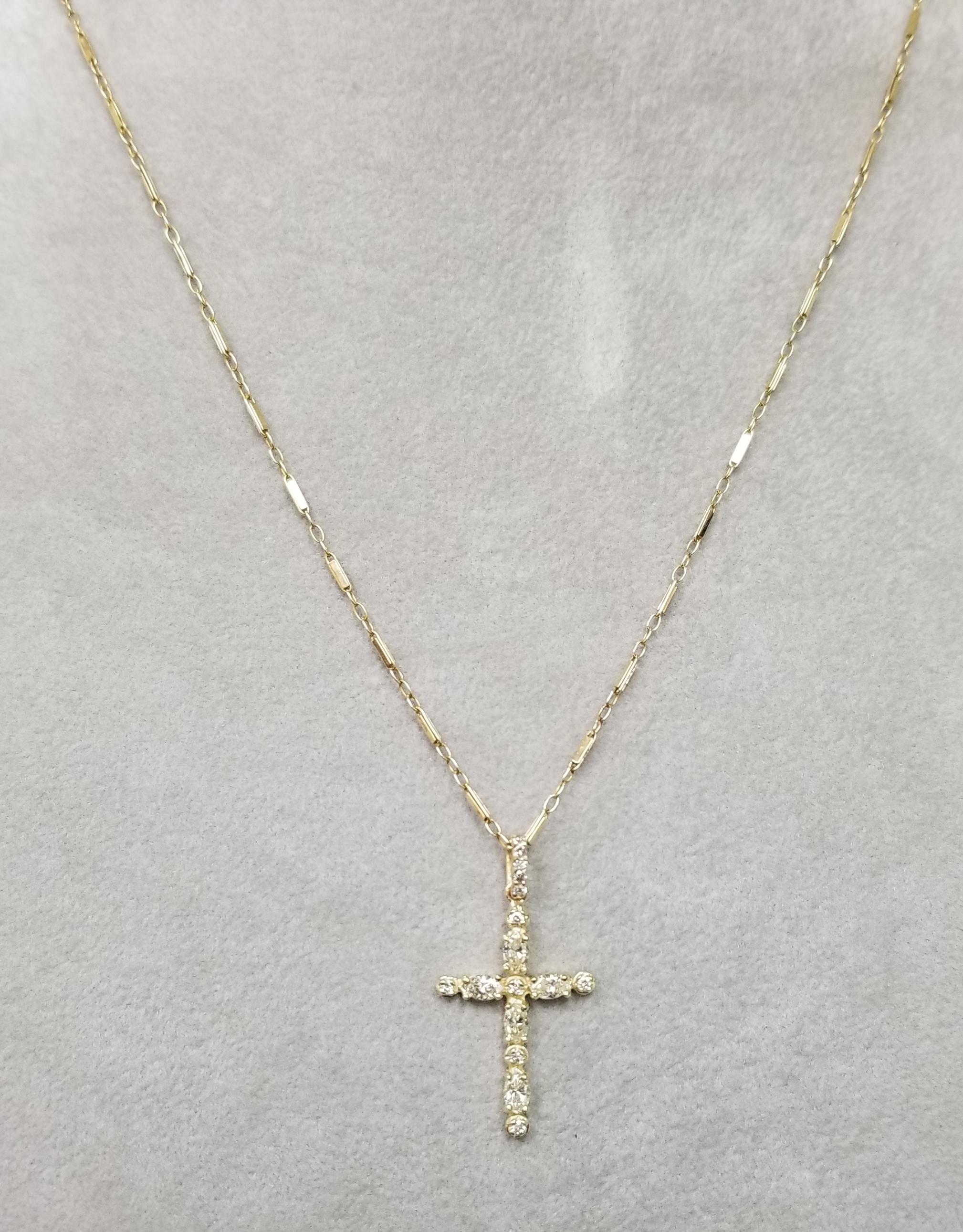 Contemporary 14 Karat Yellow Gold Diamond Cross Total Weight .86pts For Sale