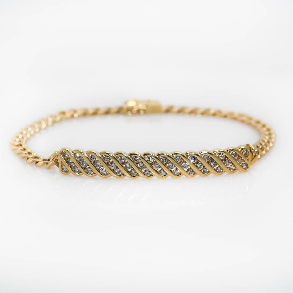 Bracelet à maillons courbes en or jaune 14 carats et diamants 1,15 carat en vente 1