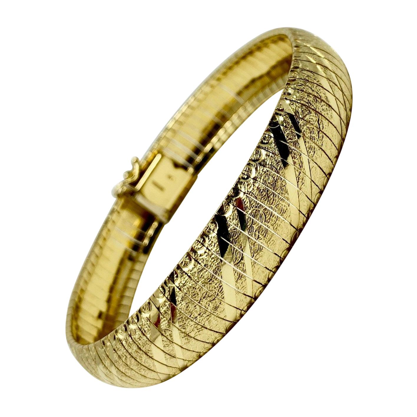 14 Karat Yellow Gold Diamond Cut Etched Omega Link Bracelet