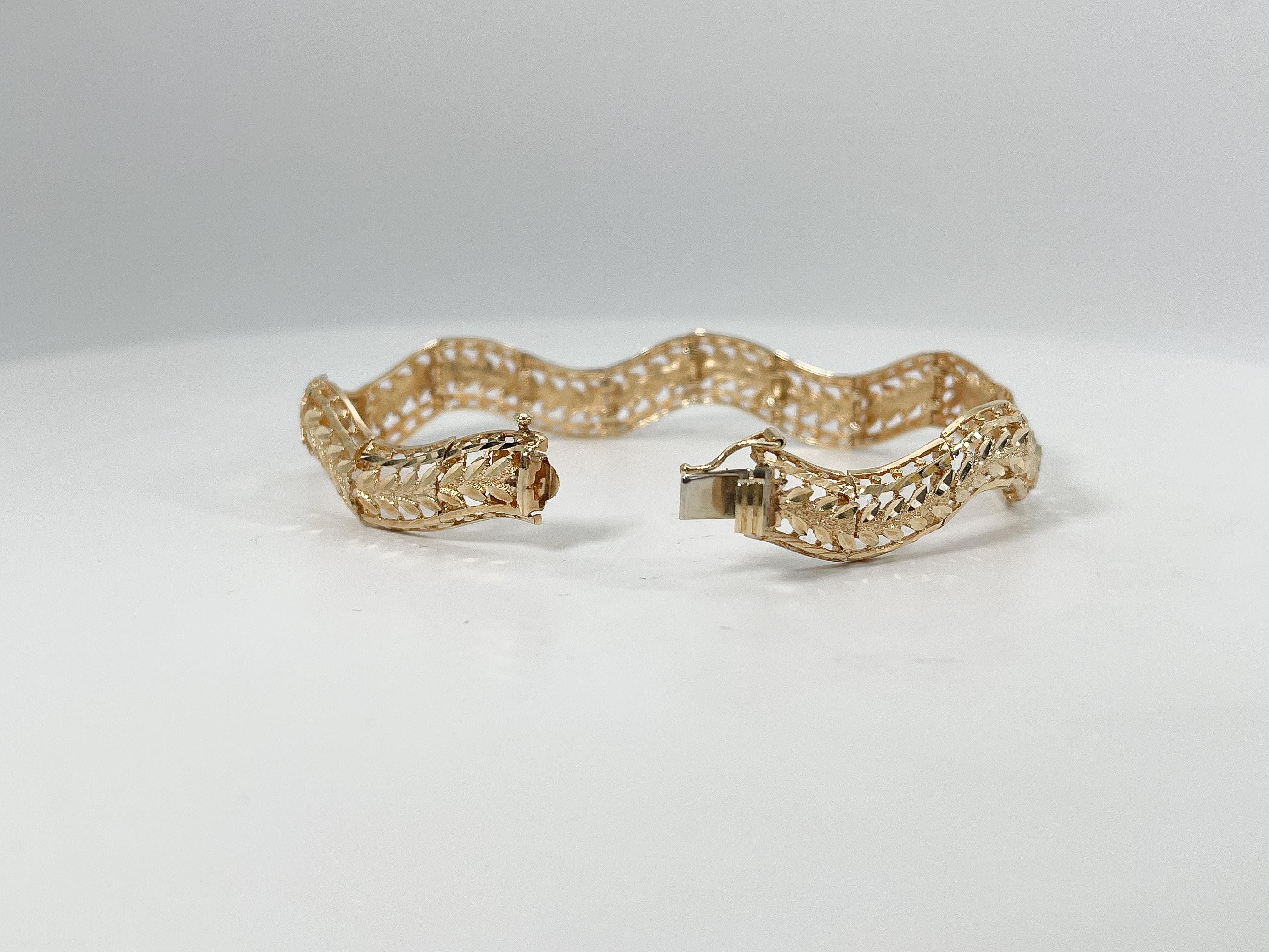 Women's 14K Yellow Gold Diamond Cut Wave Bracelet  For Sale