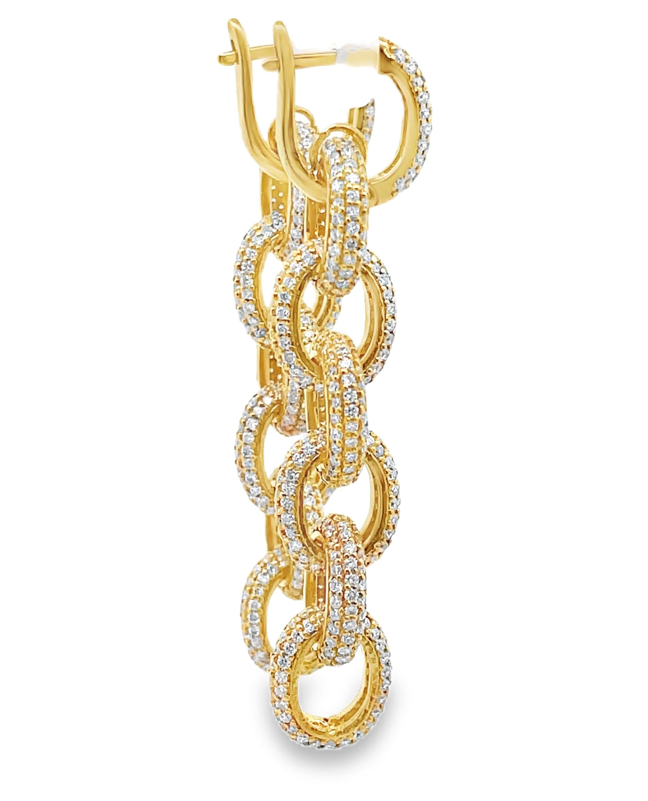 14K yellow gold dangle link earrings with round faceted diamonds weighing 5.01 carats total. 

- Diamonds are G/H color, SI clarity.
