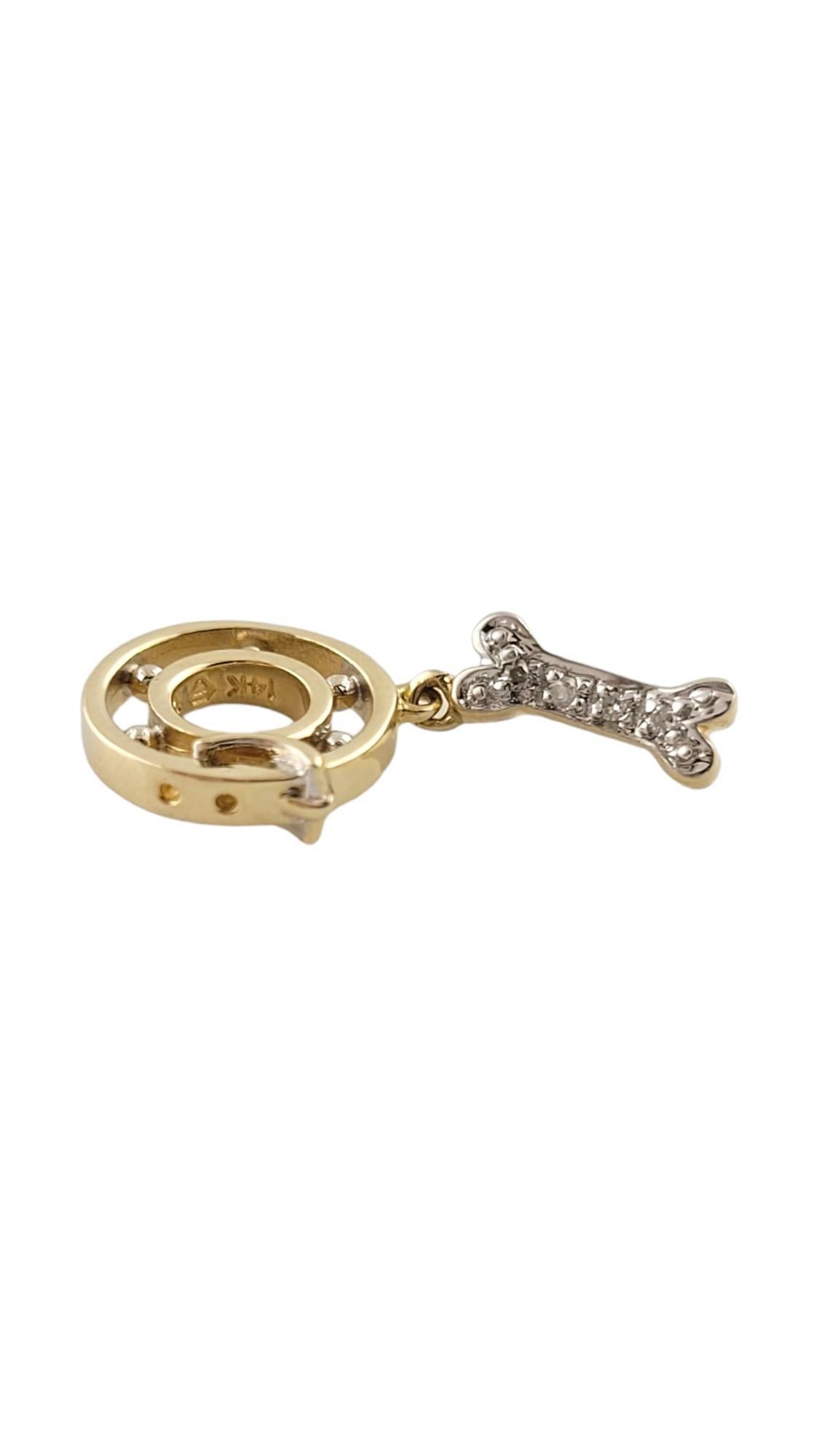 14K Yellow Gold Diamond Dog Collar Charm

This adorable charm was meticulously crafted from 14K yellow gold and features 4 sparkling single cut diamonds!

Approximate total diamond weight: .02 cts

Diamond color: J-K

Diamond clarity: SI1-I1

Size: