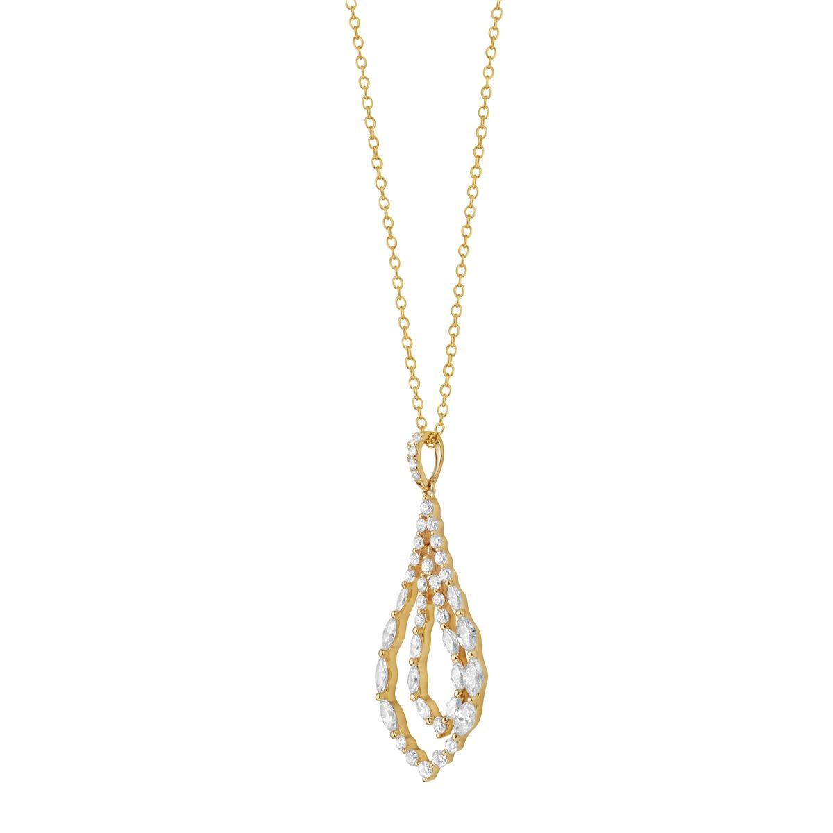 Ce pendentif goutte à goutte en or jaune 14K à diamants est une pièce étonnante qui ajoute de l'élégance et de l'éclat à n'importe quelle tenue. Fabriqué en or jaune massif de 1,6 gramme, il est léger et agréable à porter au quotidien. Le pendentif