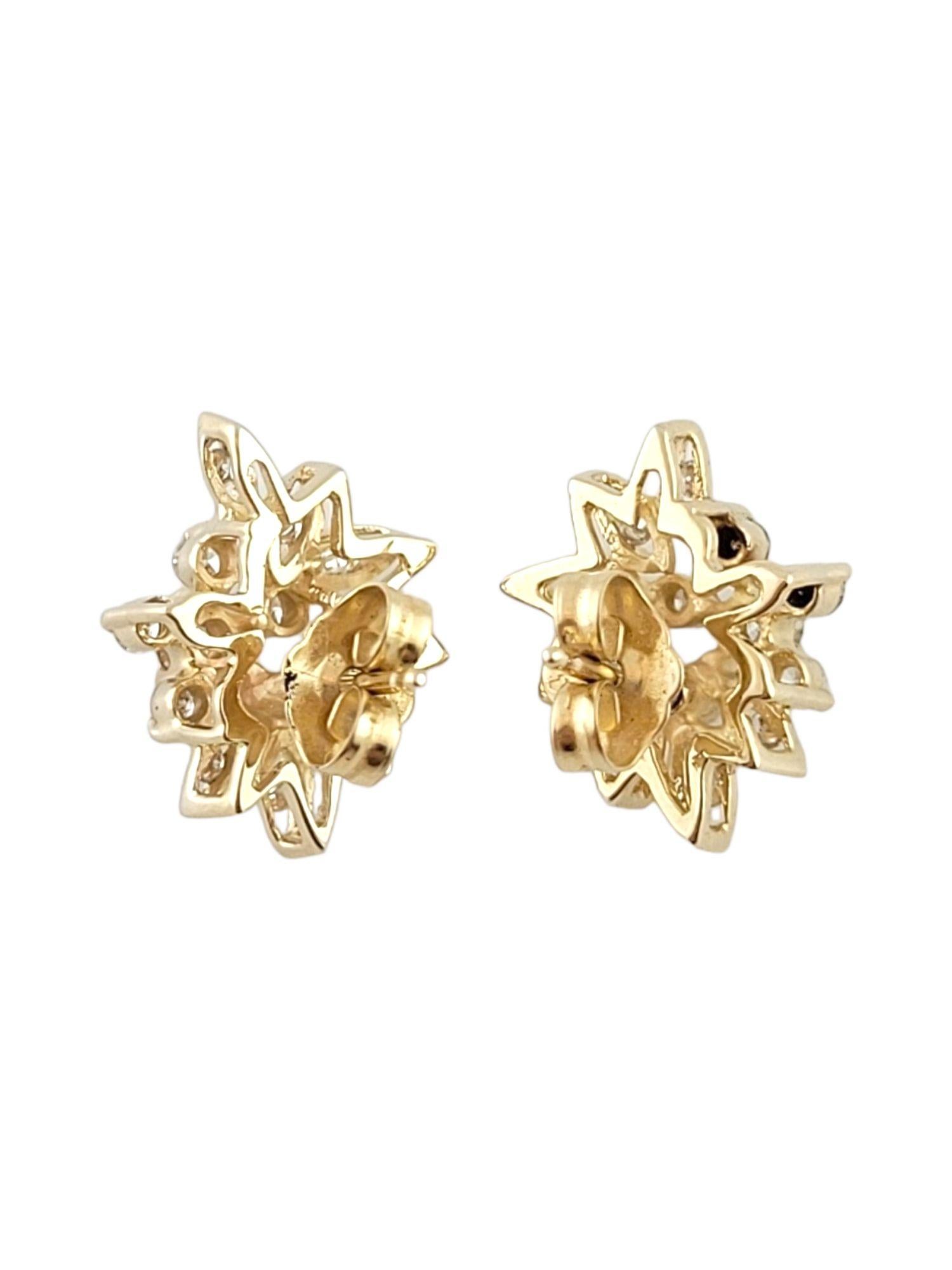 This gorgeous set of earrings features 26  sparkling, round brilliant cut diamonds set in 14K yellow gold!

(13 diamonds each earring, 26 total)

Approximate total diamond weight: .50 cts

Diamond clarity: SI1-I1

Diamond color: G

Size: 14.3mm X
