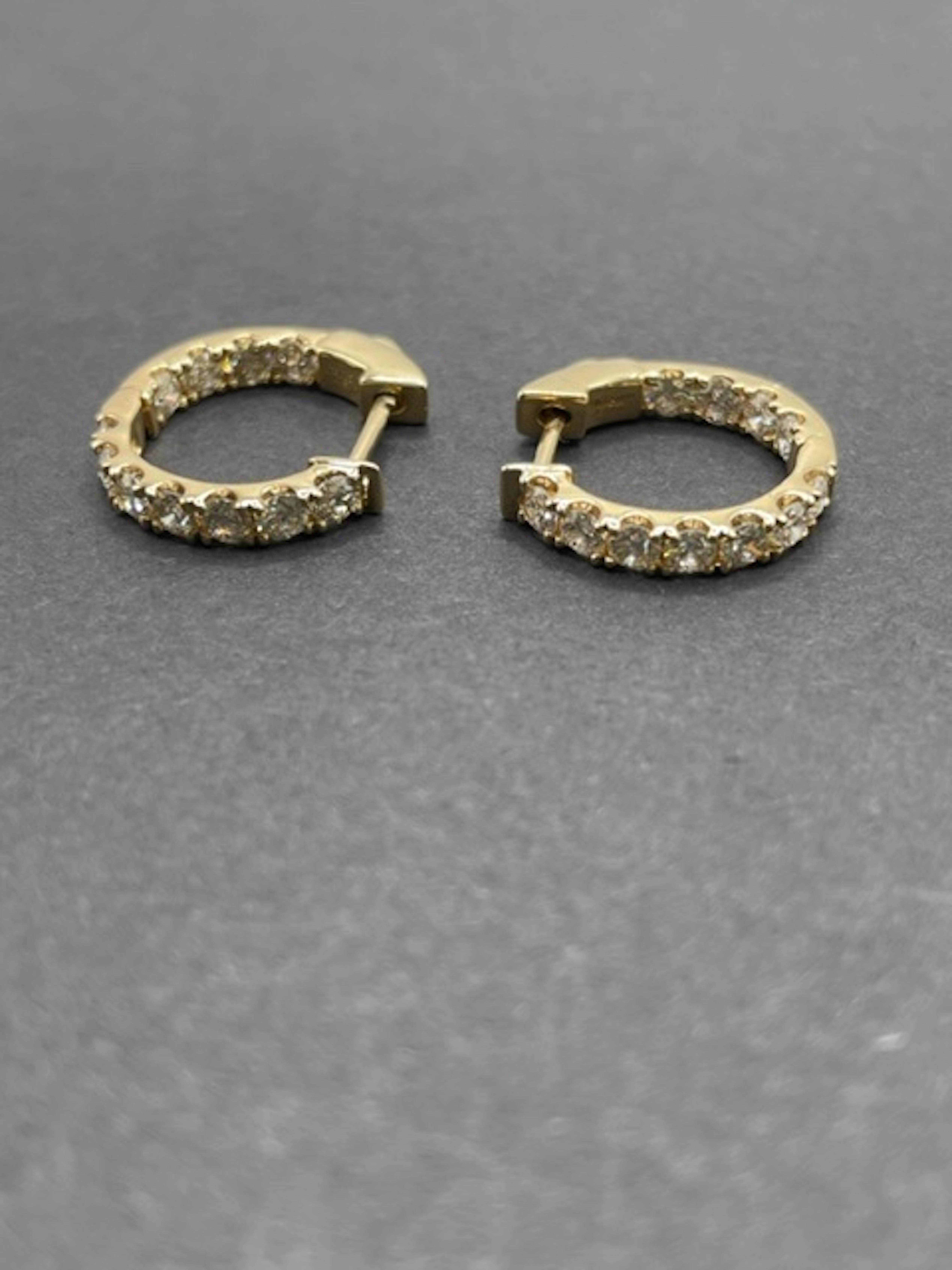 14k Yellow Gold Huggies' Diamond Earrings
Total Diamond Weight: 1.50ct
14k Yellow Gold
Color: HI
Clarity: SI-2-I1
