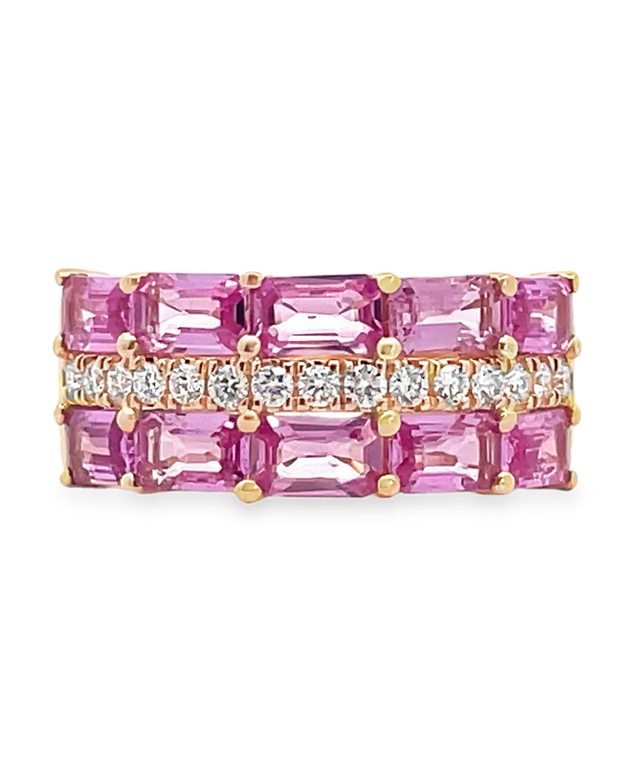 14K yellow gold fashion ring with round faceted diamonds weighing 0.27 carat total and 10 emerald cut natural pink sapphires weighing 2.99 carats total.  

- Finger size 6.5
