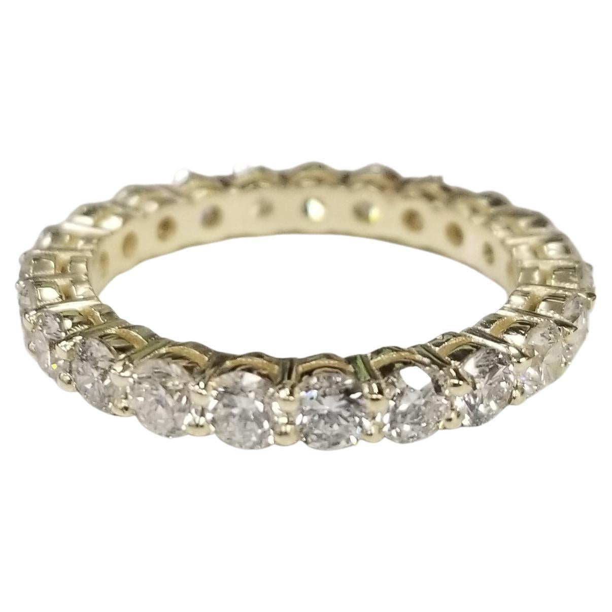 14K Yellow Gold Diamond Eternity Ring with 2.58cts. Set with Shared Prong For Sale