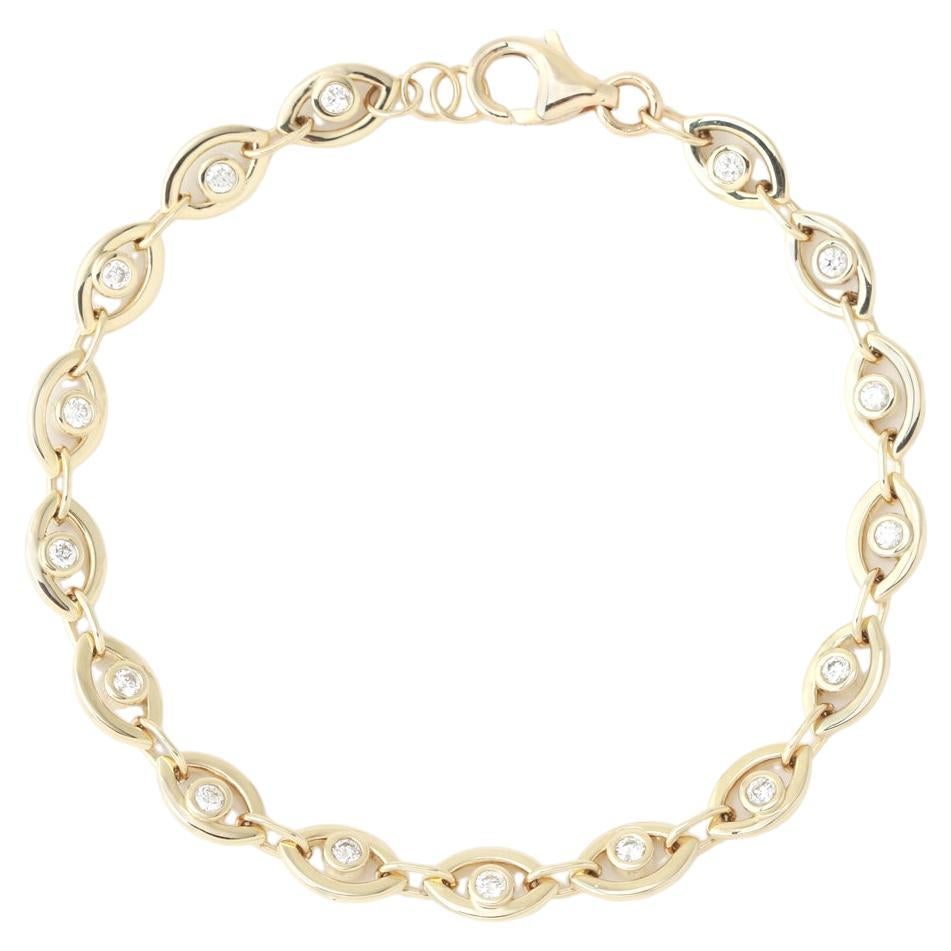 Bracelet tennis oeil en or jaune 14 carats et diamants en vente