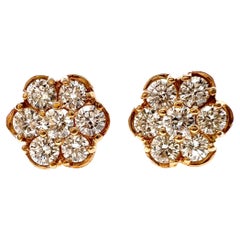 Clous d'oreilles de style floral en or jaune 14 carats avec diamants