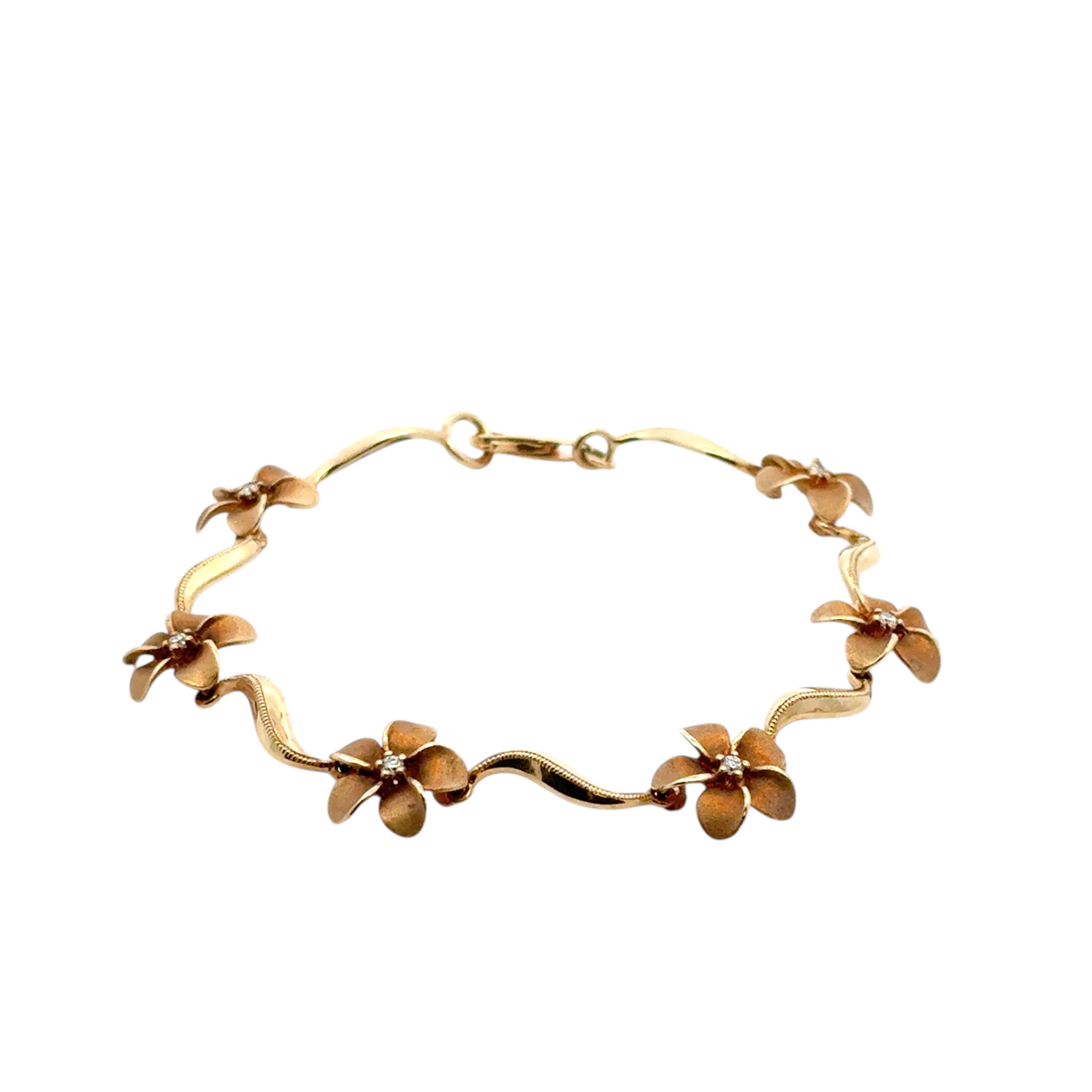 14k Yellow Gold Diamond Flower Bracelet

This 14k Yellow Gold Diamond Flower Bracelet is in excellent condition and is ready to ship!

Slip this bracelet around your wrist, and a bouquet of gold blooms to life. First, six satin-finished flowers