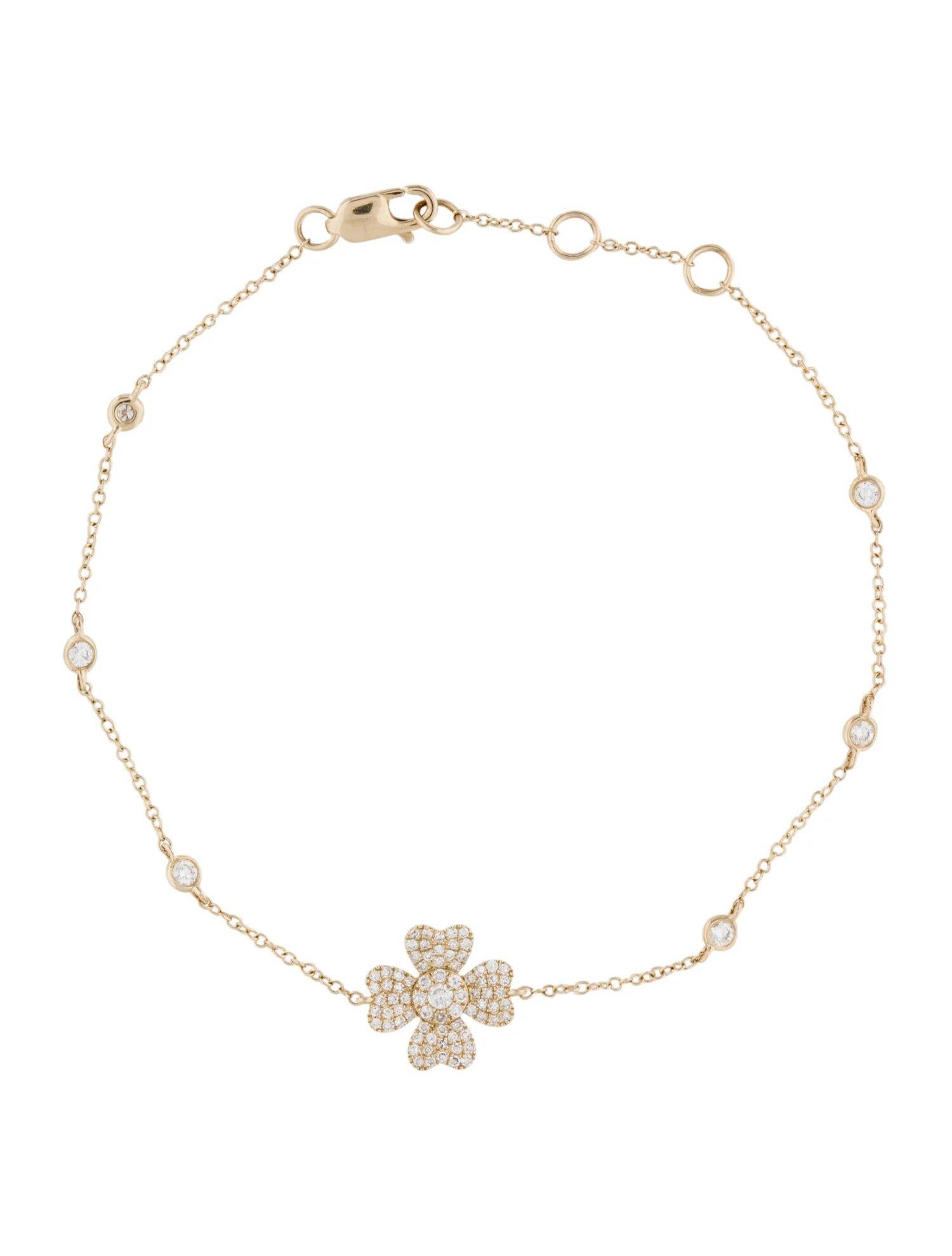 Ce bracelet en diamants brille dans l'or poli de 14k. Avec environ 0,32 ct. de diamants ronds. Portez-le seul pour une touche délicate, ou associez-le à vos autres bracelets pour une pile personnalisée et étincelante ! La couleur et la clarté du