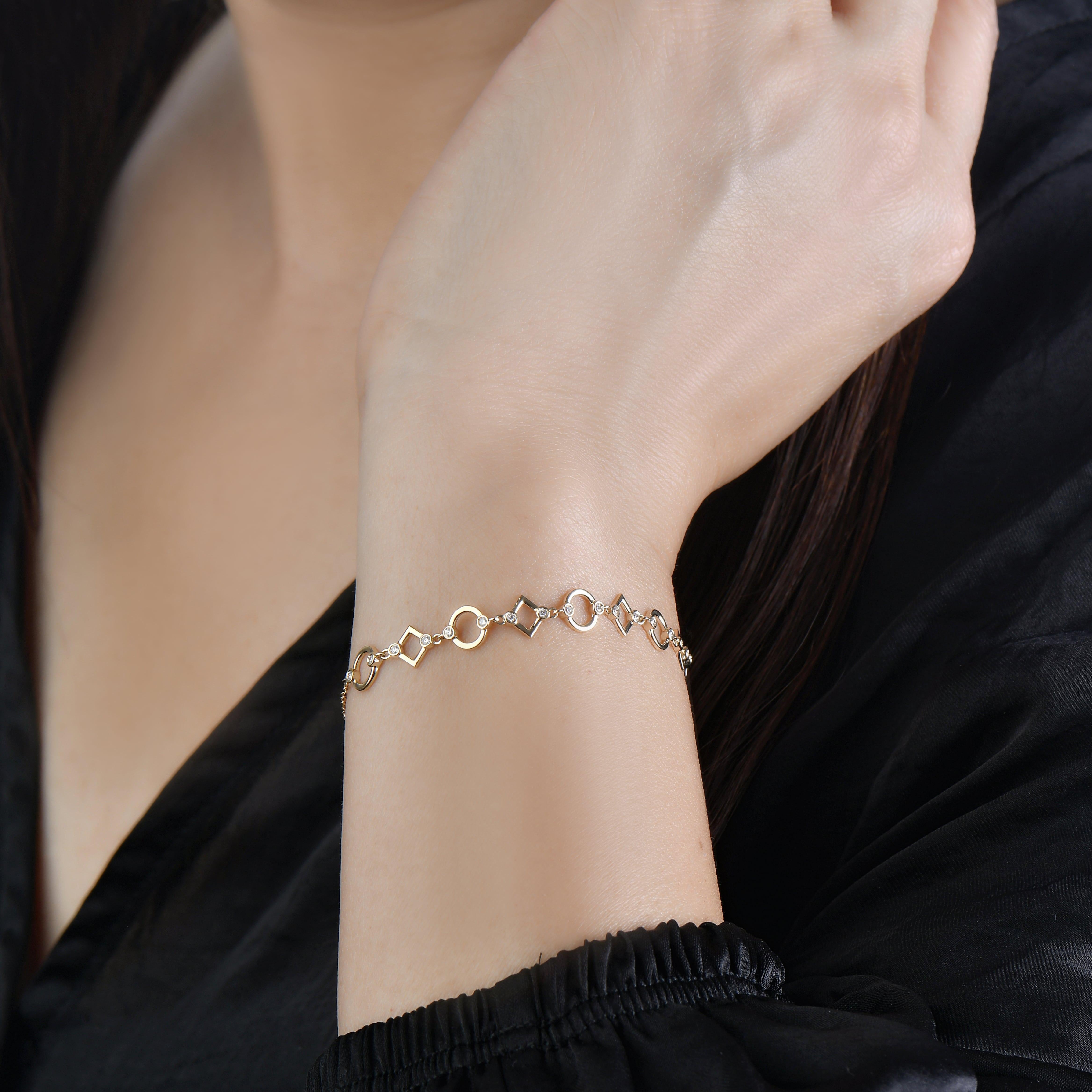 This geometric diamond bracelet embodies femininity. A classy and chic design, the bracelet embodies the connection between two people. This romantic piece is the perfect stackable bracelet yet it's chic enough to wear as a standout. 

14K Gold
