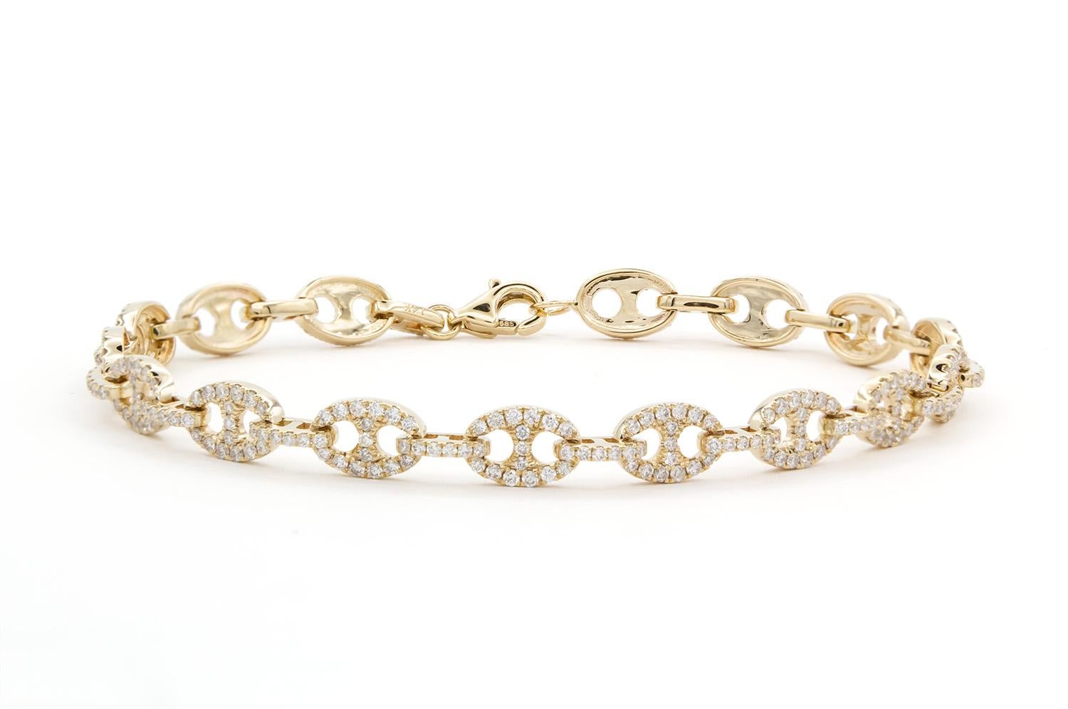 We are pleased to present this beautiful Brand New 14k Yellow Gold & Diamond Gucci Link Tennis Bracelet. It features 1.49ctw G-H/VS2-SI1 Round Brilliant Cut Diamonds set in this 14k yellow gold Gucci style link tennis bracelet. The bracelet measures