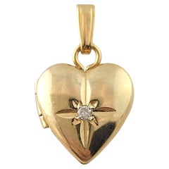 Médaillon en or jaune 14 carats orné de diamants en forme de cœur n° 16572