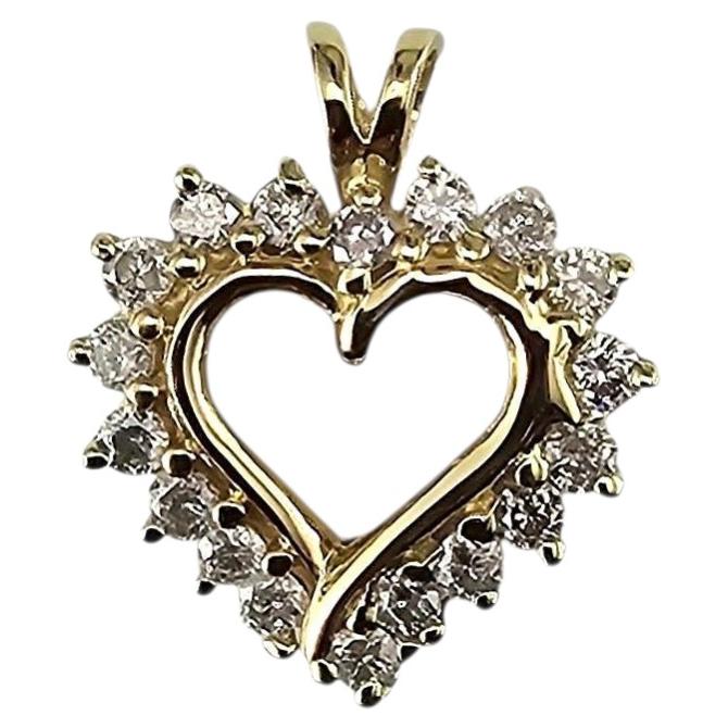 Ciondolo a cuore con diamante in oro giallo 14K #24382