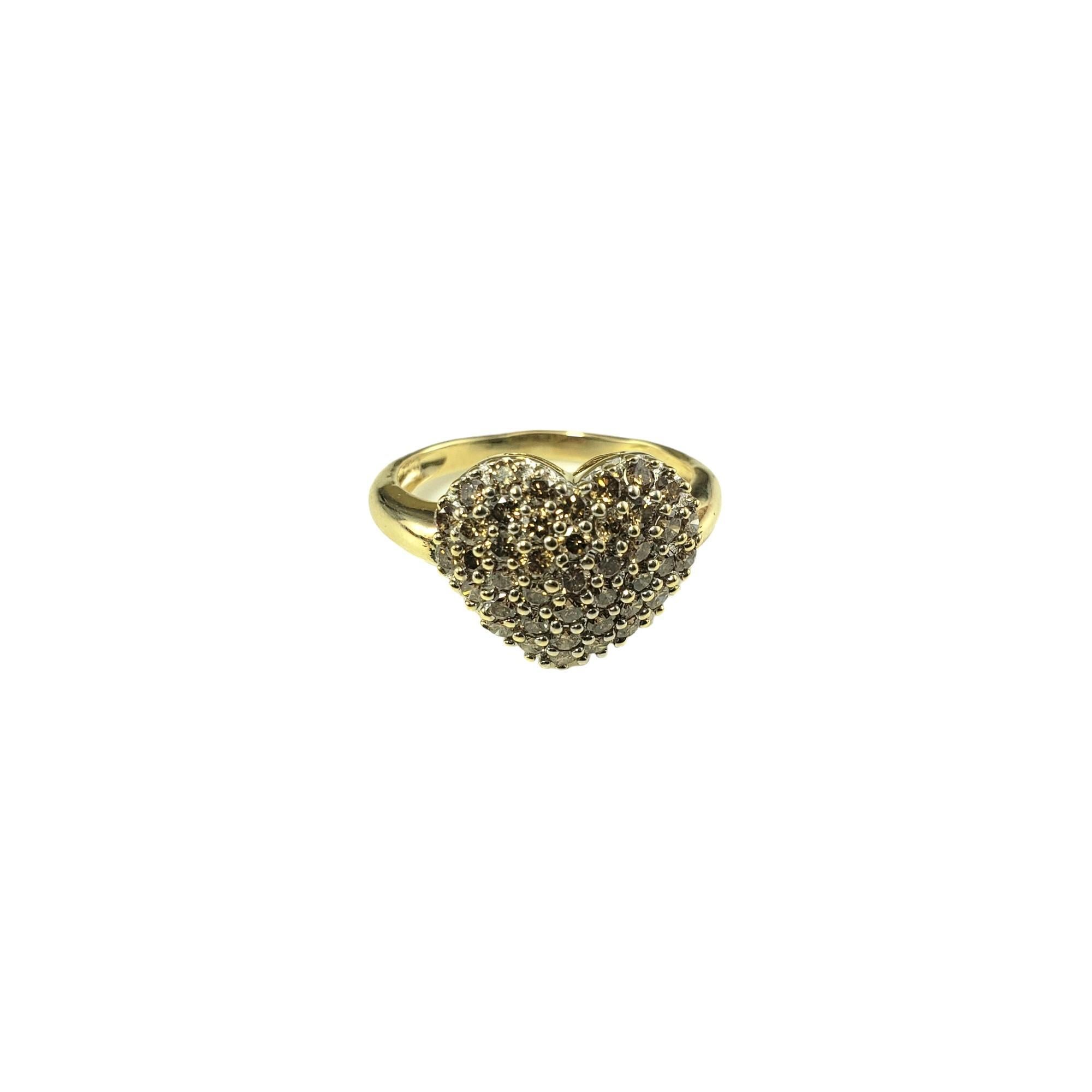 Vintage 14K Yellow Gold Diamond Heart Ring Size 7-

This lovely ring 42 round champagne cut diamonds set in classic 14K yellow gold.  Width: 13 mm.  
Shank: 2 mm.

Approximate total diamond weight: .84 ct.

Diamond color: champagne

Diamond clarity:
