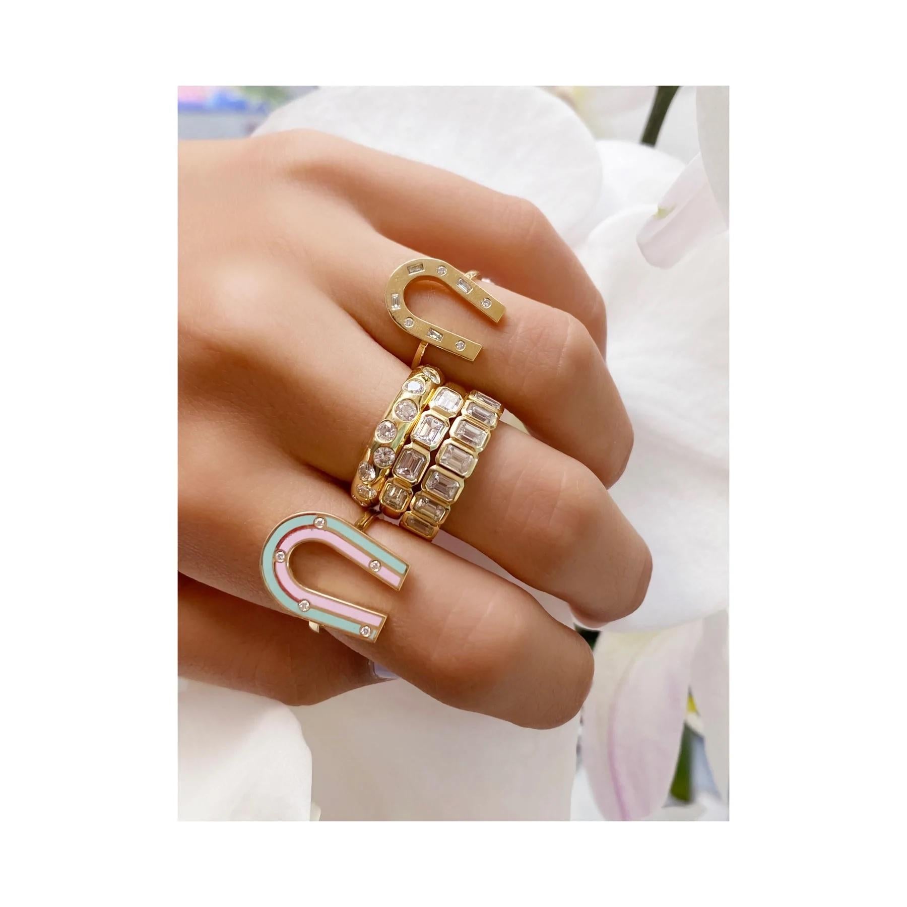 Magnetize your heart's desires and elevate your spring style with this gorgeous 14k and and Mixed Diamond ring. Inspired by the shape and form of magnets and horseshoes, symbols of attraction and good fortune; Use it as a modern talisman along with