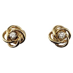 Orecchini con nodo di diamanti in oro giallo 14K #23520