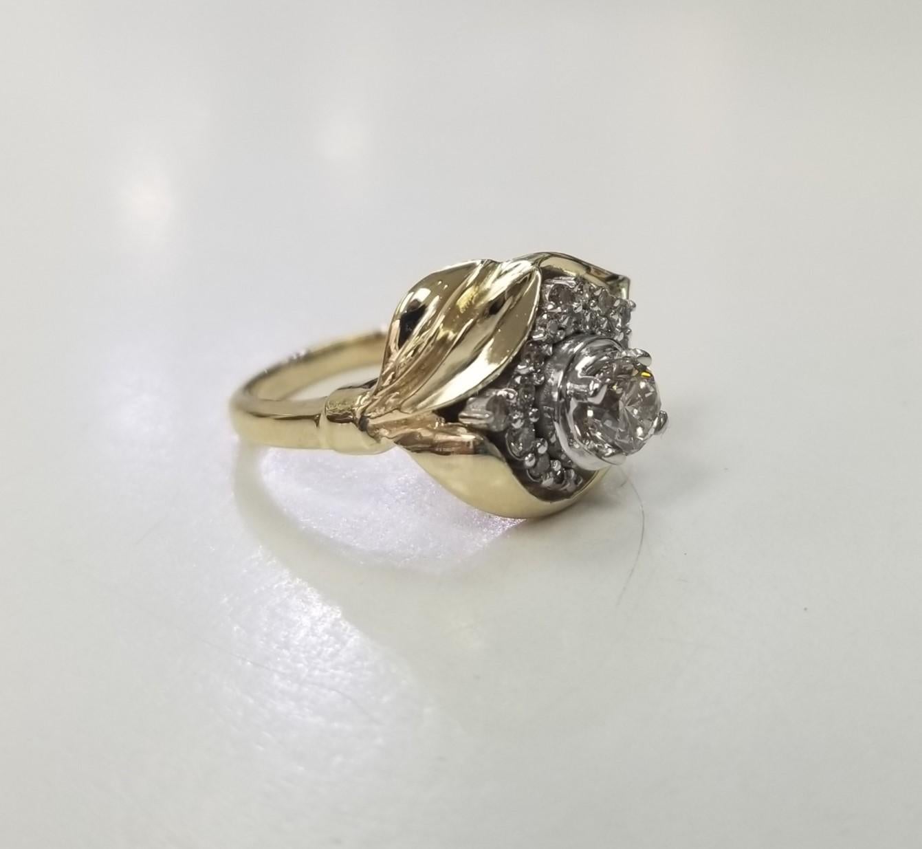 14k yellow gold ladies diamond ring containing 1 brilliant cut diamond   weight .76pts. 
Specifications:
Metal: 14K Yellow Gold
Weight: 5.8 Gr
Center stone: 0.48 pts. Round Cut 
Side Stones: 0.28 pts. Diamonds
Size: 6 US