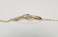 14 Karat Yellow Gold Diamond "Love Knot" Bracelet