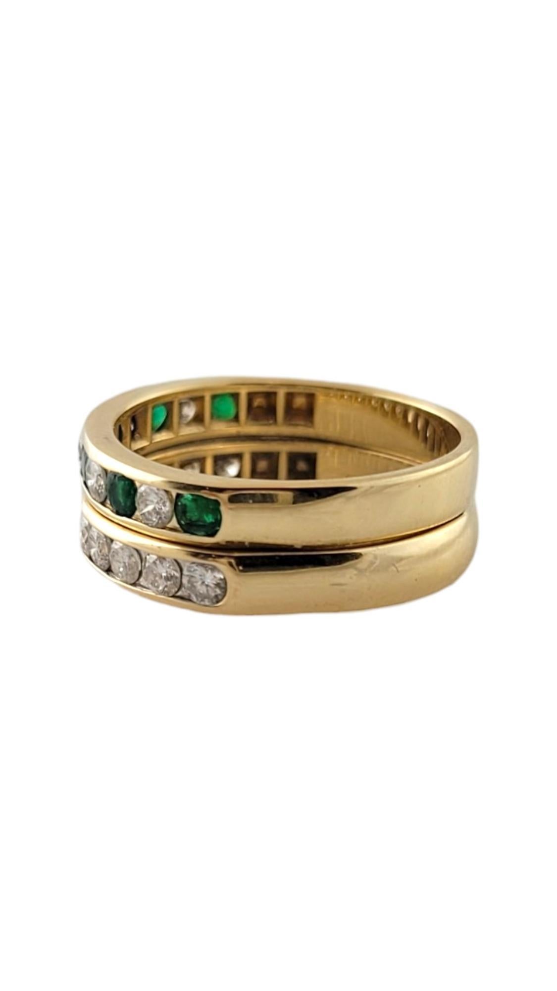 14K Yellow Gold Diamond & Natural Emerald Double Band Ring Size 6.25

This beautiful piece features 2 bands that have been permanently smoldered together to create a gorgeous ring! The ring features 16 round brilliant cut diamonds and 6 round cut