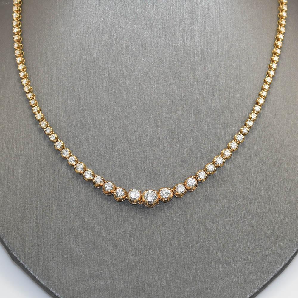 14K Yellow Gold Diamond Necklace, 6.90tdw, 22.1g

Ladies diamond necklace in 14k yellow gold setting.

Stamped 14k and weighs 22.1 grams gross weight.

The diamonds are round brilliant cuts in a tapered setting.

The center diamond is .60 carats and