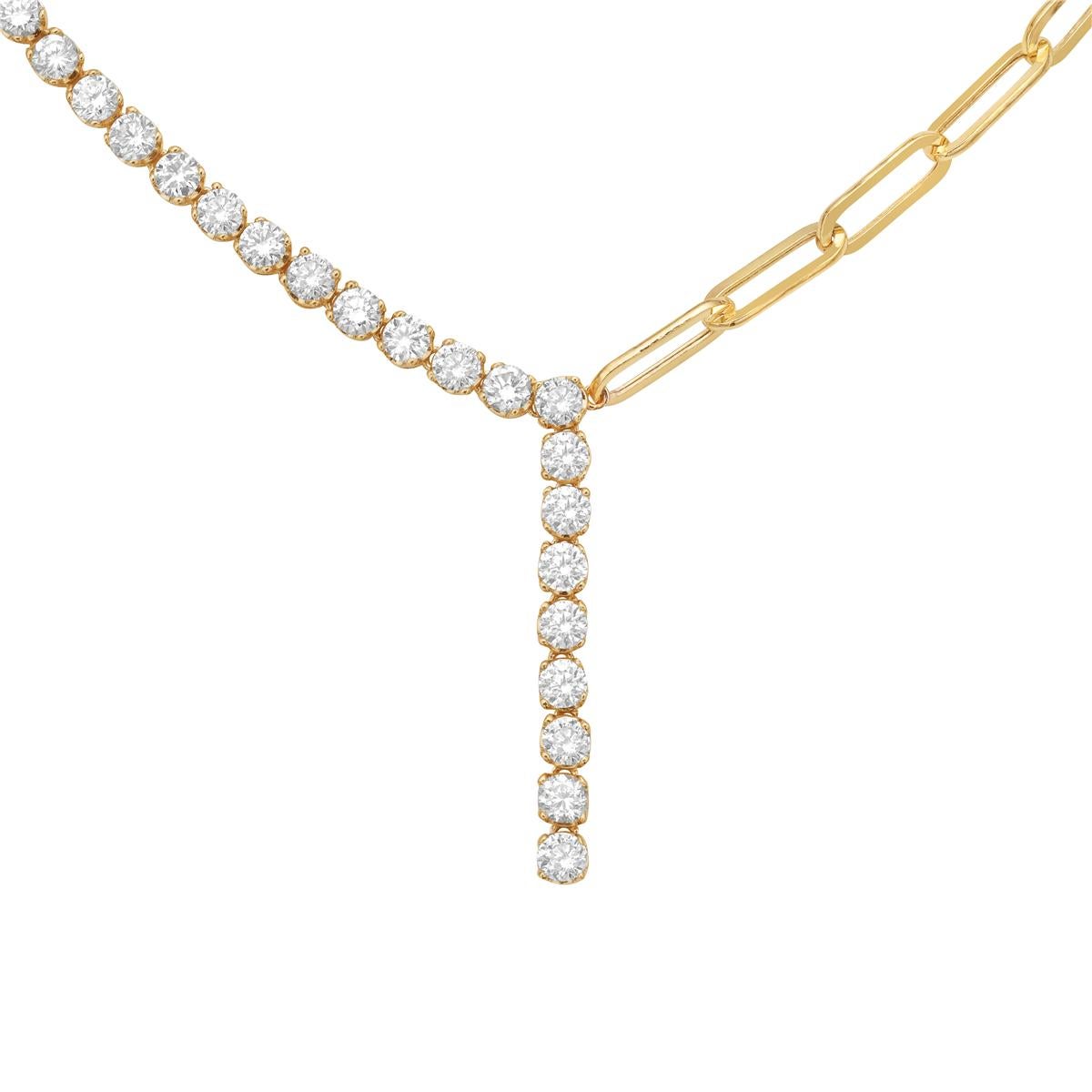 Ce collier de diamants en or jaune 14 carats est une pièce intemporelle et élégante qui ajoute de l'éclat à n'importe quel look. Fabriqué en or jaune massif de 5,3 grammes, il est à la fois durable et agréable à porter. Que ce soit pour une occasion