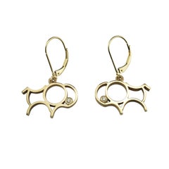 Boucles d'oreilles pendantes en or jaune 14K avec buffle ouvert et diamant #23404