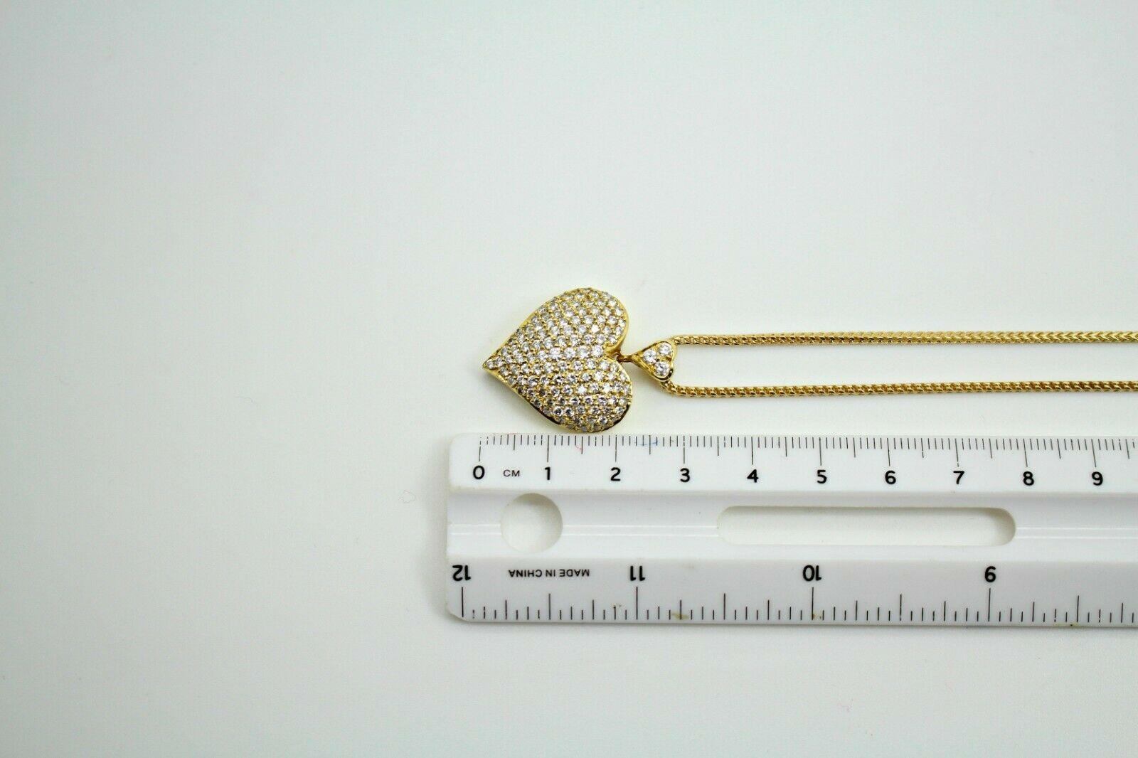 14 Karat Gold Diamond Pave Heart, Containing 2.50 Carat S Color 
