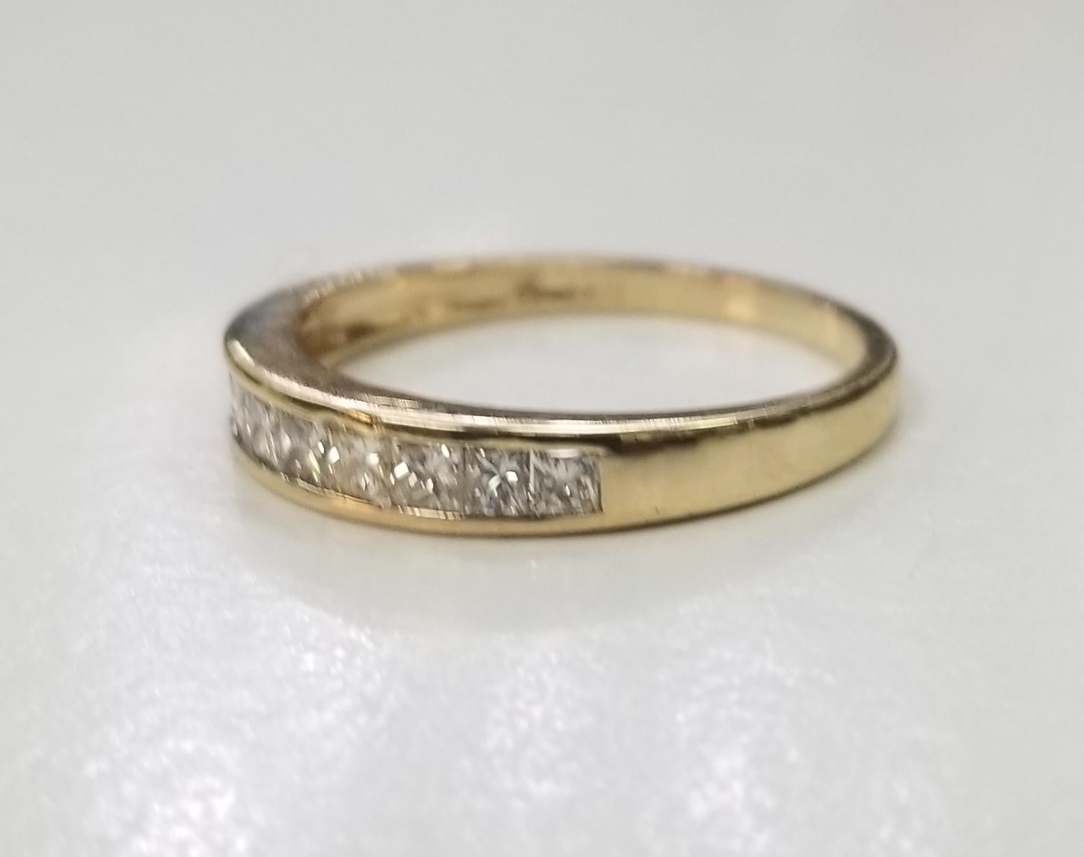 14k yellow gold diamond princess cut wedding ring, 
Specifications:
    main stone: DIAMOND   
    diamonds: 10 PCS
    carat total weight: 0.65
    color: G
    clarity: VS2
    metal: GOLD
    type: ring
    weight: 2.1 gr
    size: 7.25 US
    