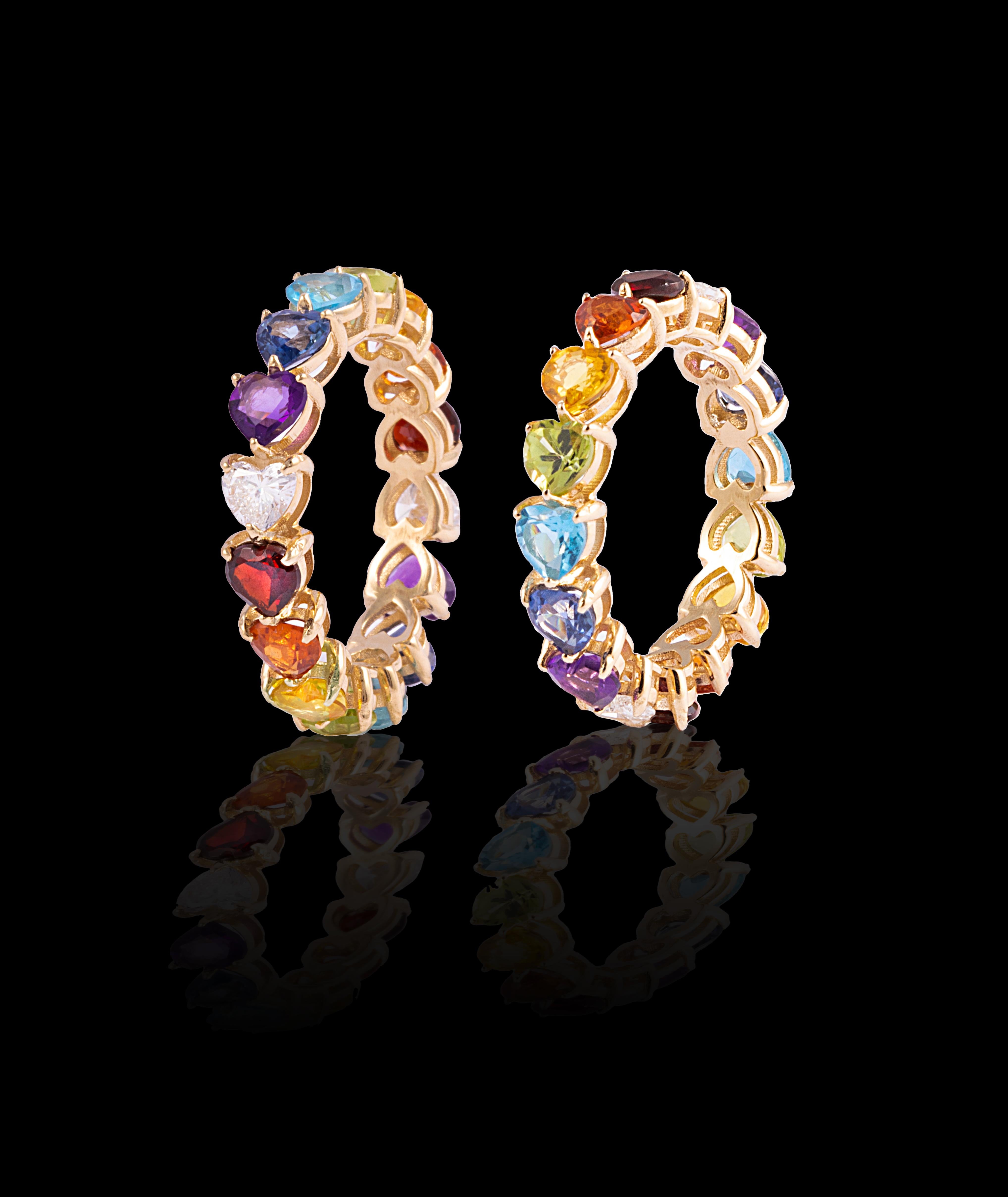 As the first fine diamond jewelry piece from the house of Mordekai, we are celebrating one of our iconic themes, the Rainbow! This unique ring is made of 14k gold, and hand-set with the finest hand-selected, colored stones and gems sourced from all