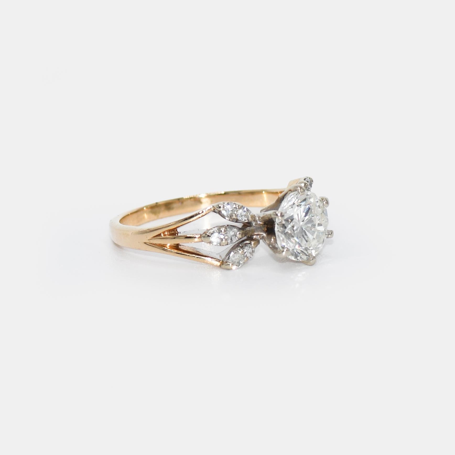 14k Yellow Gold Diamond Ring, 1.25ct Round Brilliant
14k yellow gold diamond ring.
The center stone is an 1.25ct round brilliant cut. Color is I-J, Clarity I1.
There is .10tdw in smaller single cut diamonds. 
weighs 3.7g
size 7 1/2