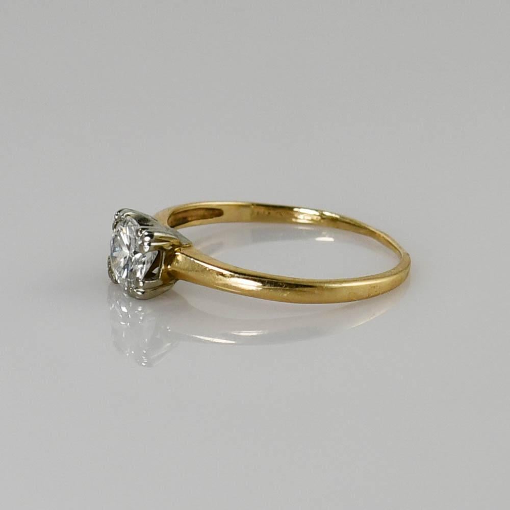Diamond solitaire ring in 14k yellow gold.
Tests 14k and weighs 1.2 grams. The diamond is a round brilliant cut, .42 carats, h color, vs clarity.
The ring size is 5 3/4 and can be sized to fit. Good condition.
