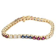 Bracelet tennis en or jaune 14 carats avec diamants, rubis et saphirs