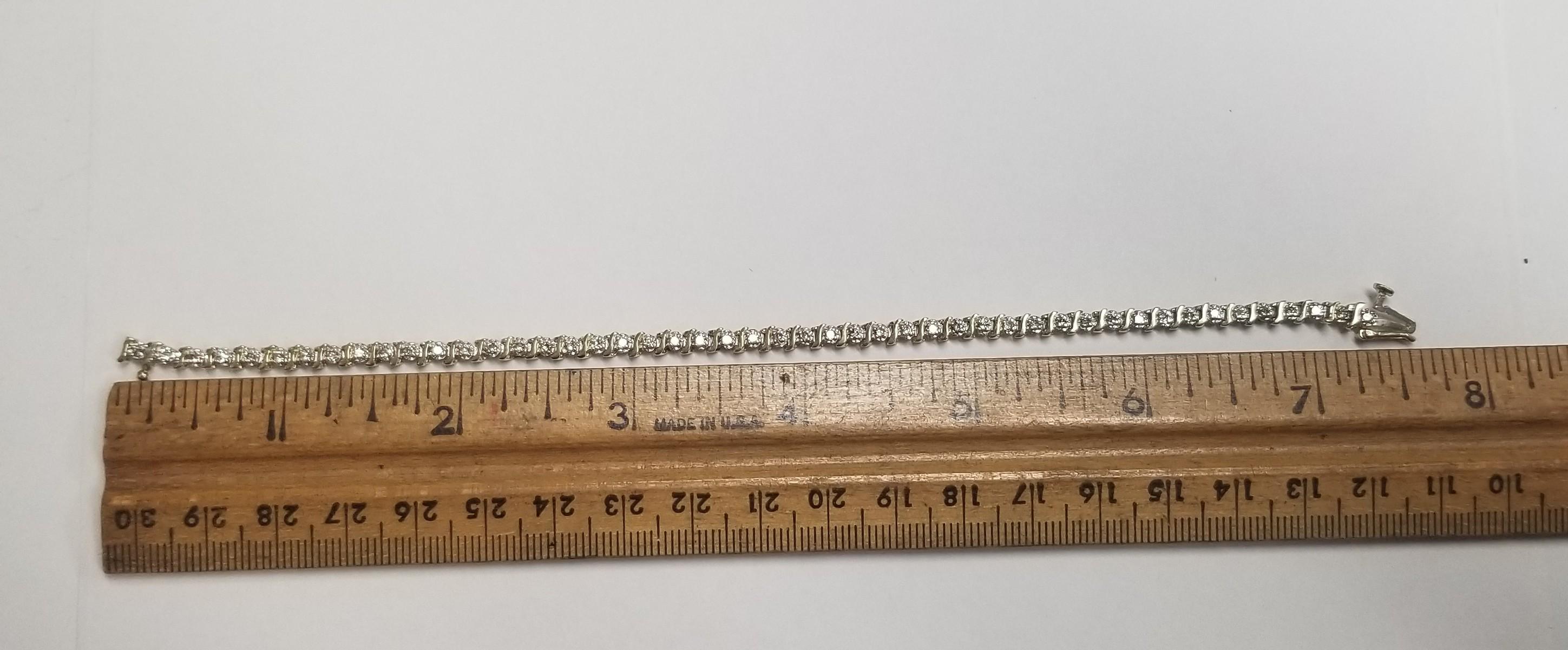 Pulsera de tenis estilo S con diamantes de oro amarillo de 14 quilates de 0,75 ctw en Excelente estado para la venta en Los Angeles, CA