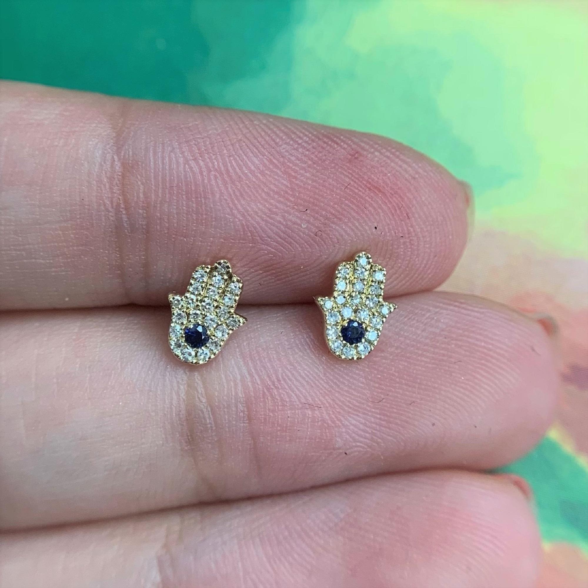 Feel protected & loved with these trendy and appealing 14k gold diamond and sapphire Hand Of Gd Studs earrings. Makes the best addition to your jewelry collection. Featuring approximately 0.11 ct. of diamonds and 0.06 ct. of sapphires. Butterfly