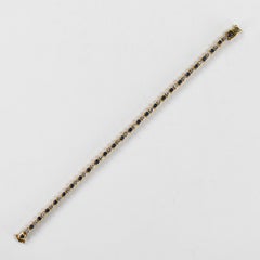 Bracelet de tennis en or jaune 14K avec diamants et saphirs 9.6g