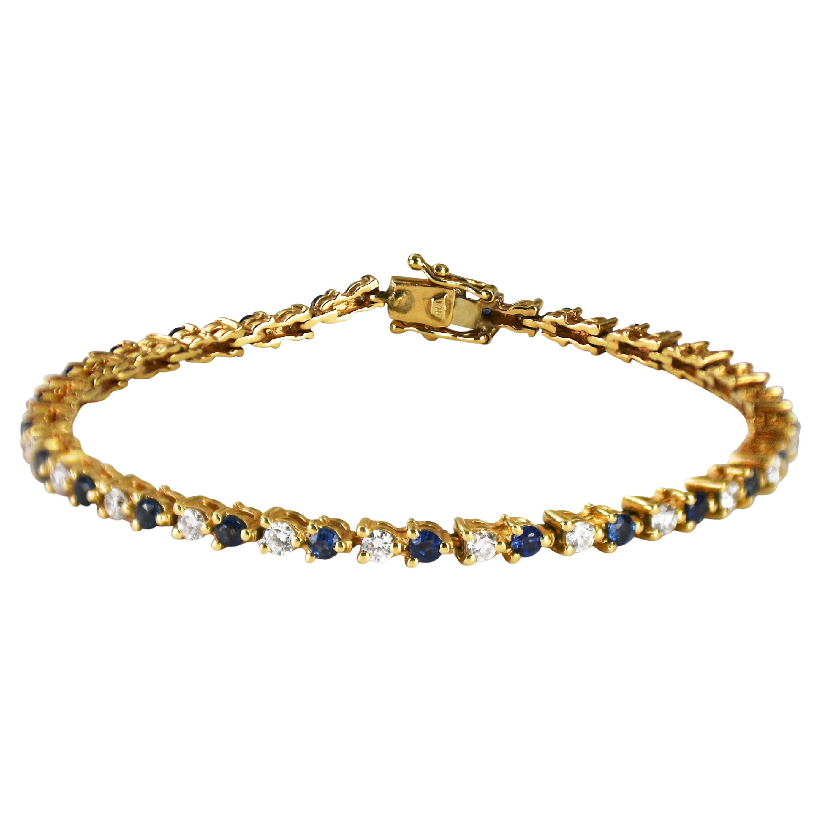 Bracelet de tennis en or jaune 14K avec diamants et saphirs 9.6g