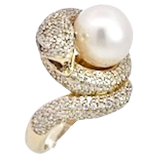 Bague serpent en or jaune 14K avec diamant et perle en vente