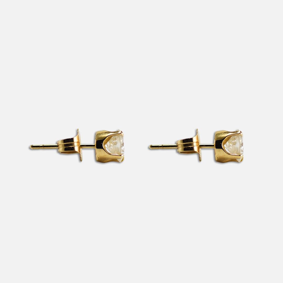 Diamond Stud Earrings that weigh 0.70 Gram
Contains Two 4.5 mm Round Brilliant Diamonds.
0.80 ct Total Weight
I2 Clarity J Color
With Push Backs 