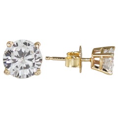 Boucles d'oreilles en or jaune 14K avec diamant 0.97ct