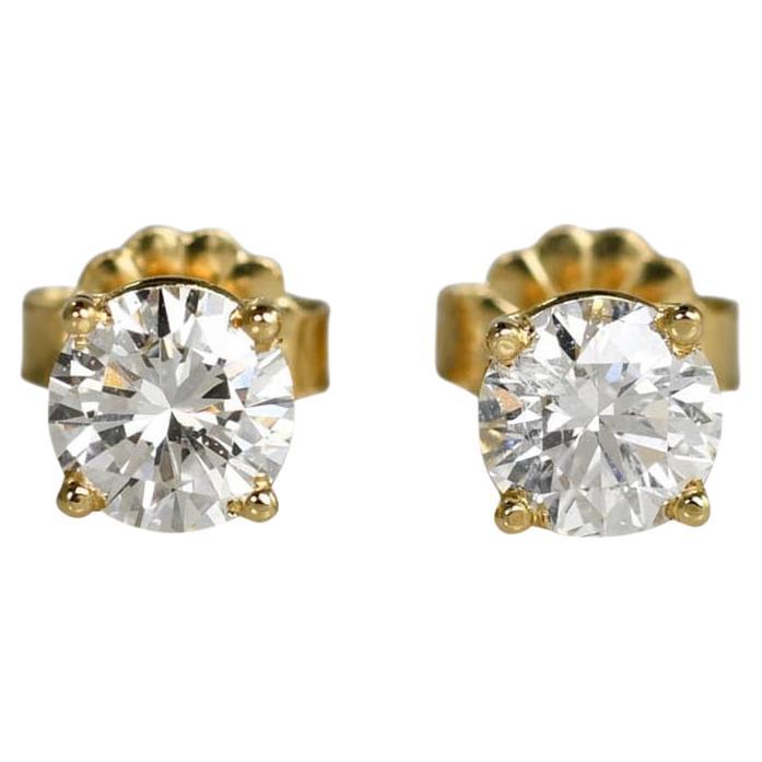 Boucles d
oreilles en or jaune 14K avec diamant 1.01ct