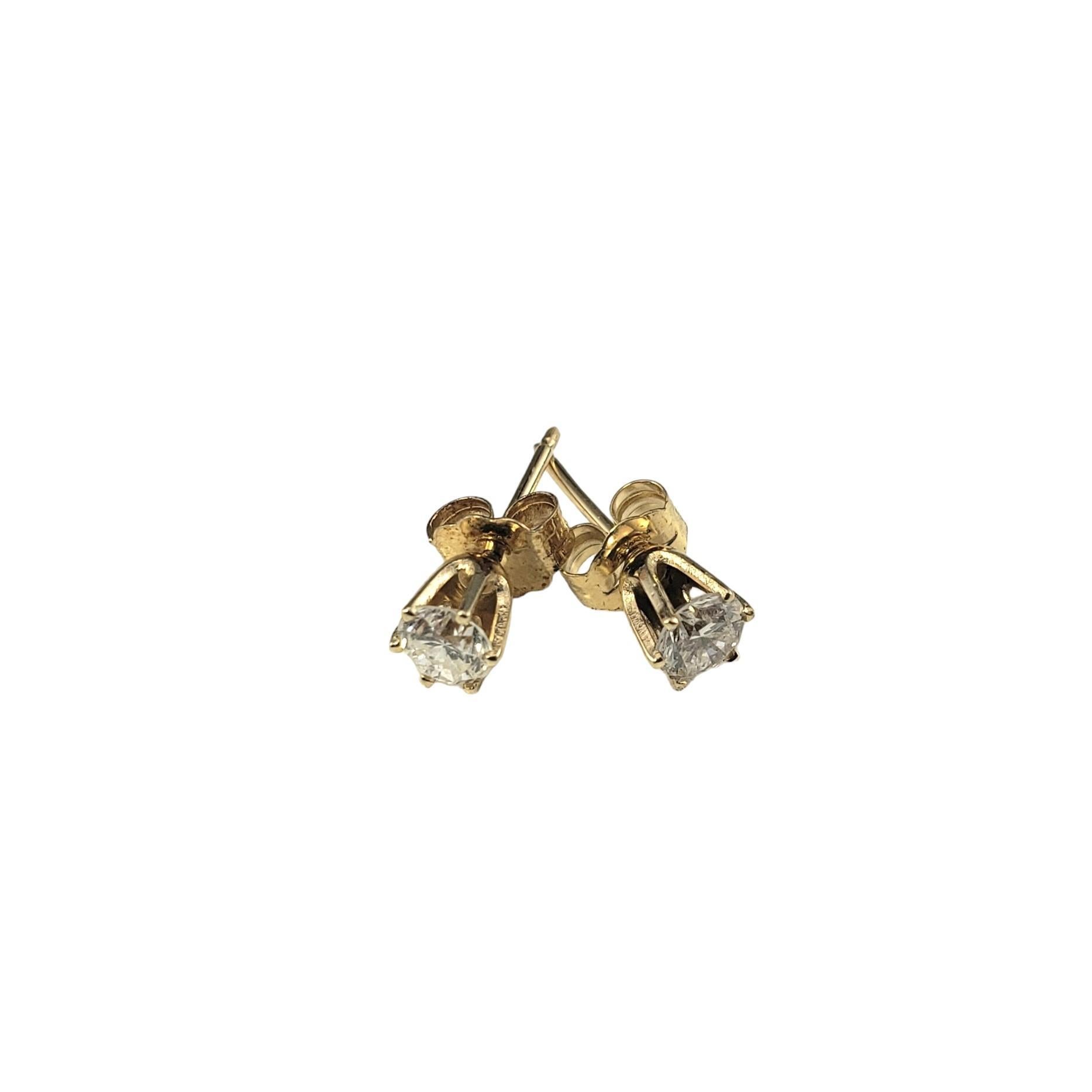 Vintage 14K Yellow Gold Diamond Stud Earrings-

These sparkling earrings each feature one round brilliant cut diamond set in classic 14K yellow gold. Push back closures.

Approximate total diamond weight: .43 ct.

Diamond color: H-I

Diamond