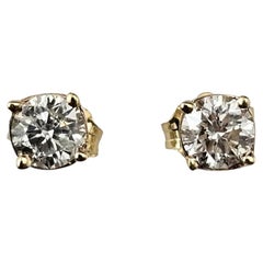 Orecchini con diamante in oro giallo 14K #23846