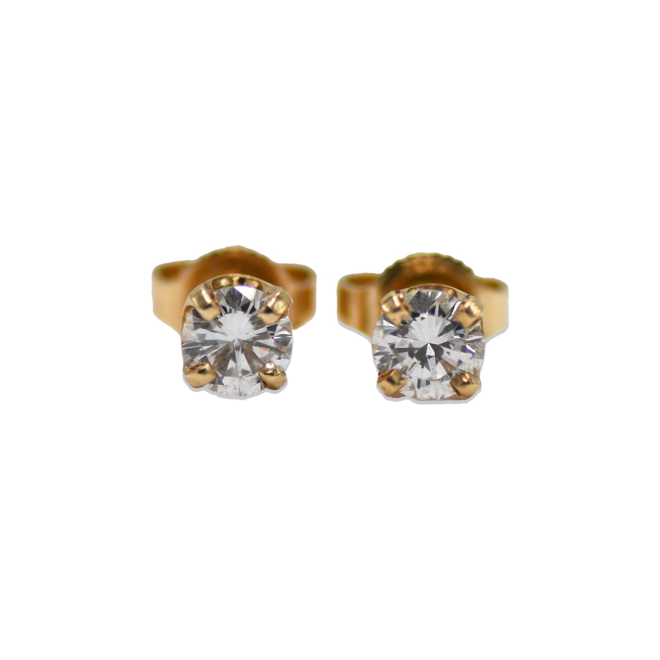 14K Yellow Gold Diamond Stud Earrings.

Elevate your elegance with these exquisite 14k yellow gold diamond stud earrings, the epitome of timeless sophistication. Each earring boasts a meticulously selected, round brilliant diamond, radiating with