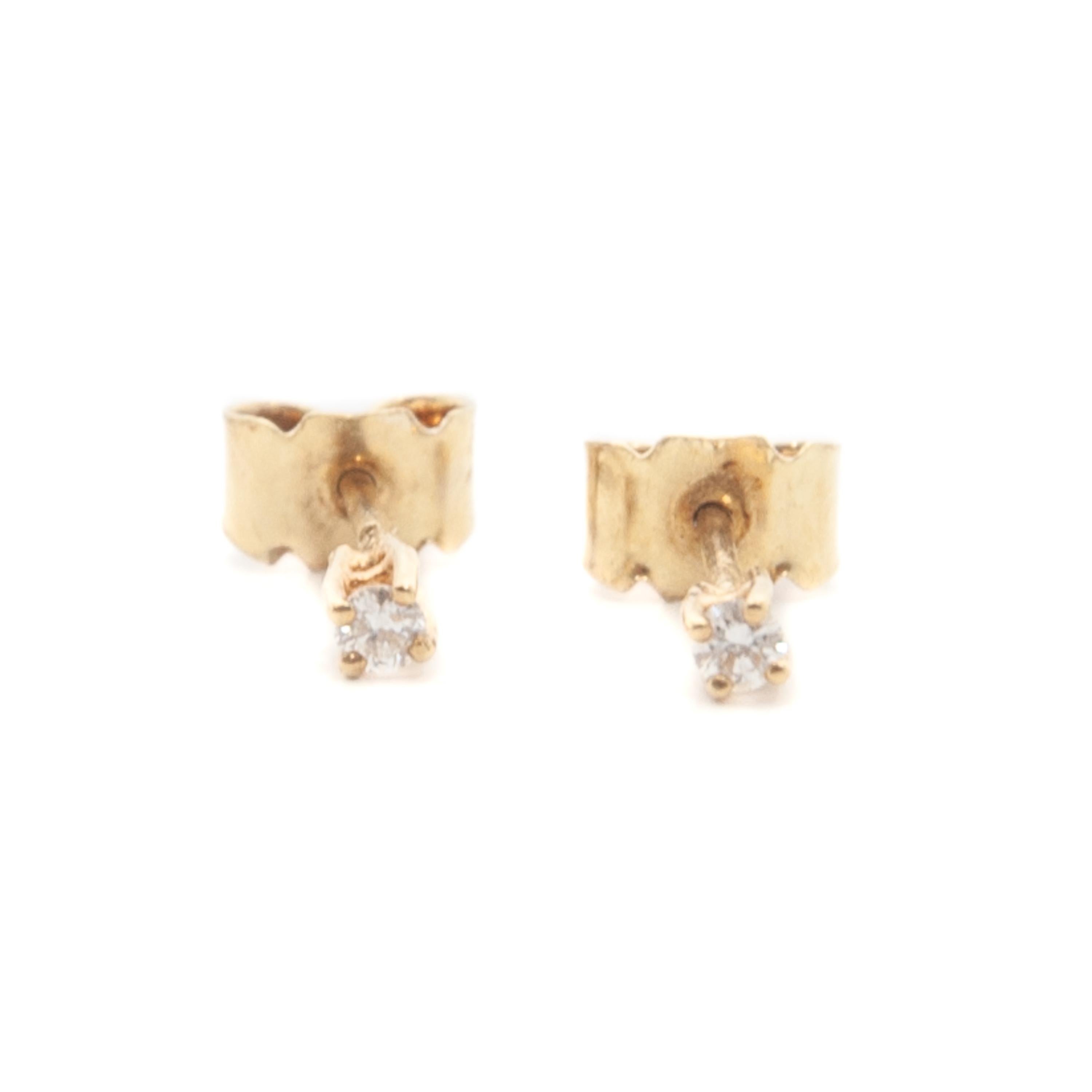 14 karat gold diamond stud earrings