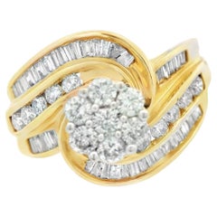 Anello con diamante a spirale in oro giallo 14k