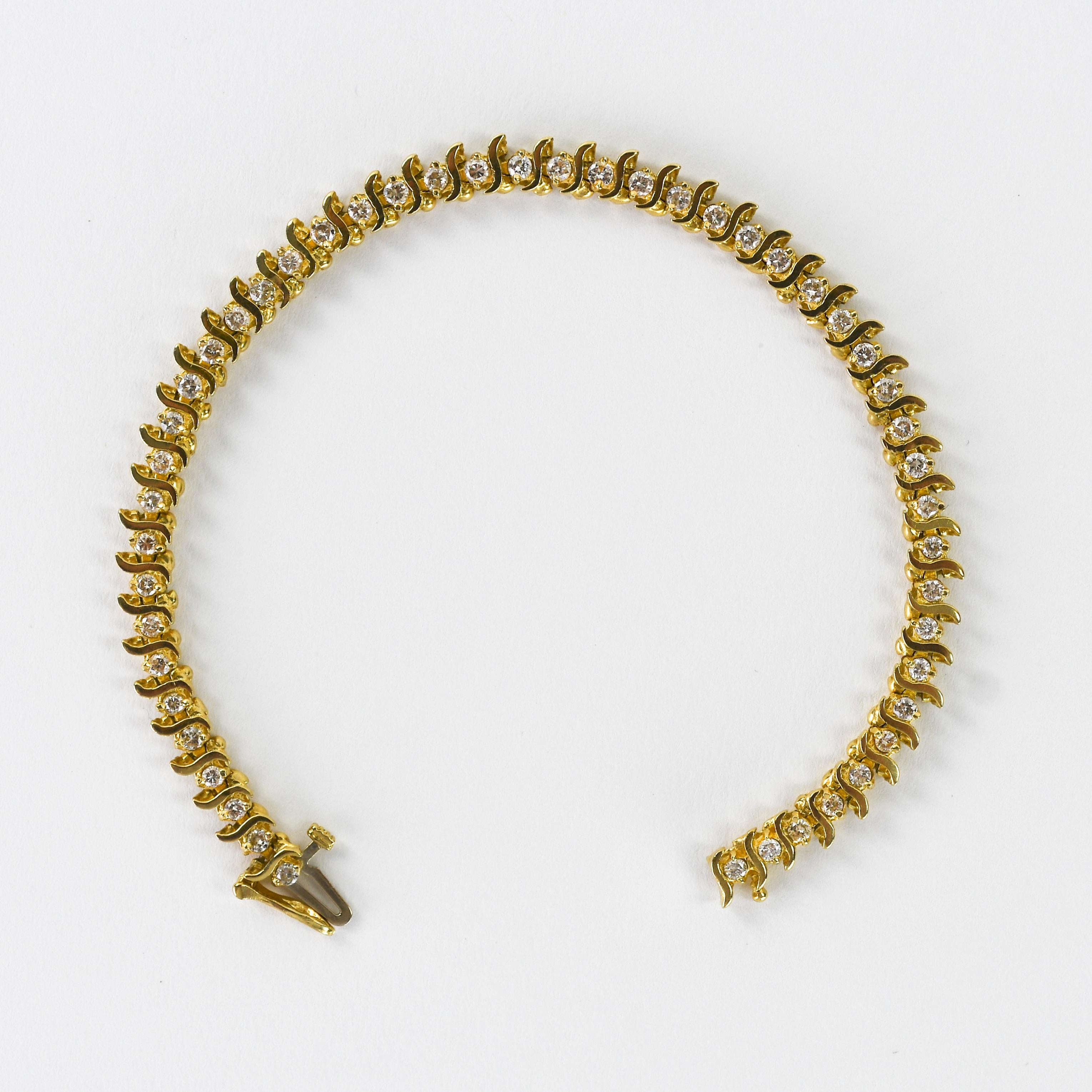 Pulsera de tenis de oro amarillo de 14 quilates con diamantes 1,50 ct Corte redondo en venta