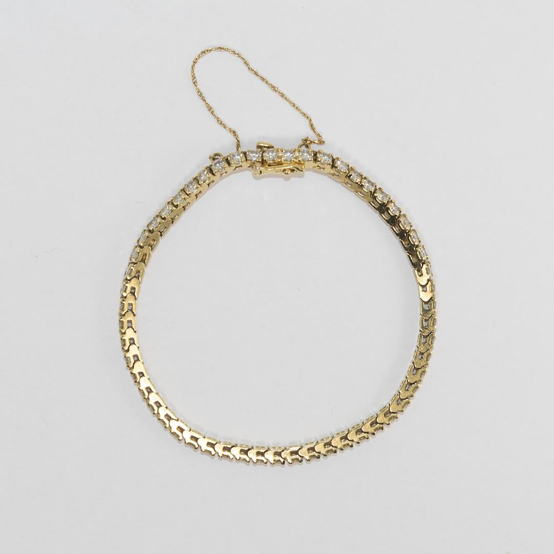 14 Karat Gelbgold Diamant-Tennisarmband 3,00 Karat im Zustand „Hervorragend“ im Angebot in Laguna Beach, CA