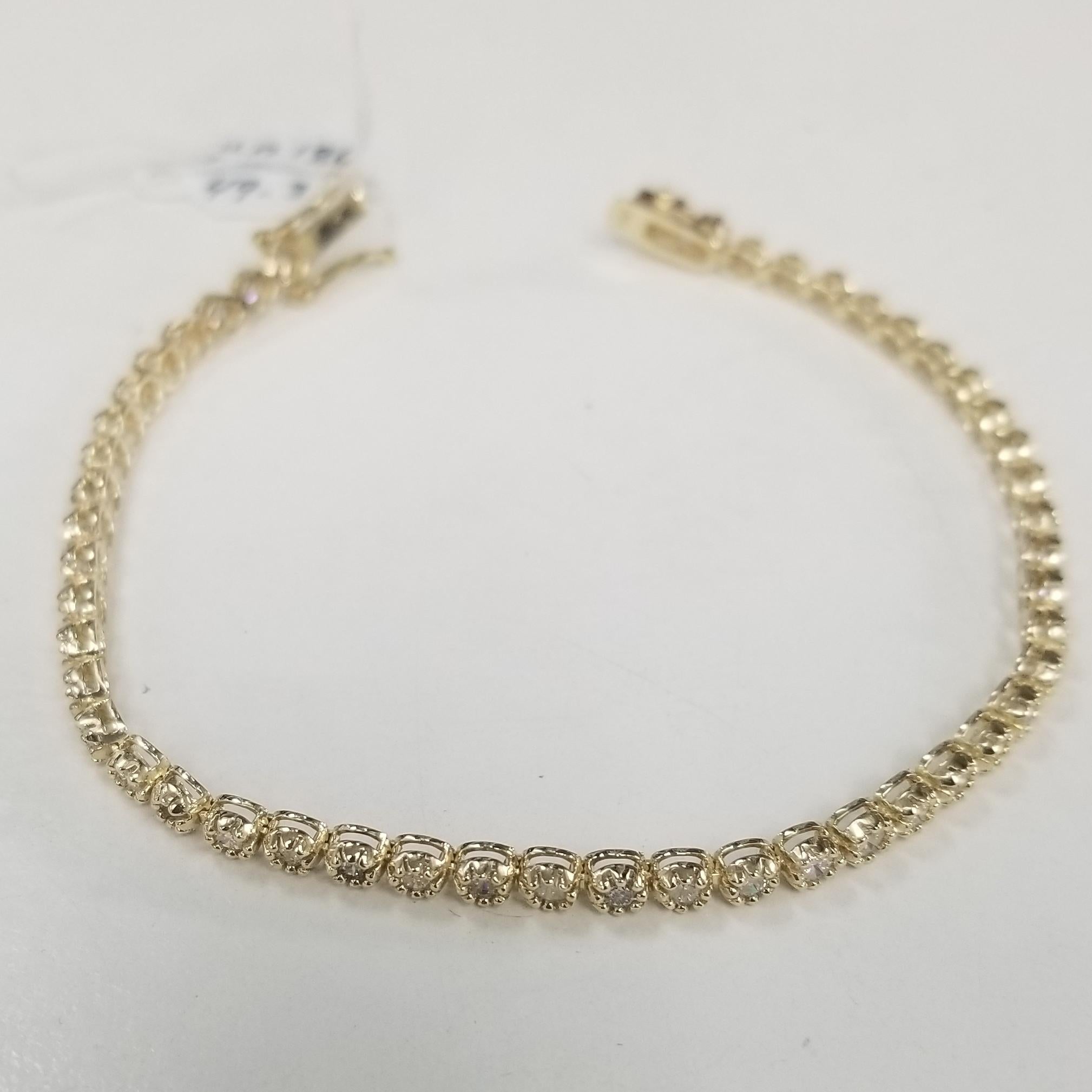 Specifications:
    main stone:ROUND DIAMONDS
    diamonds: 49 PCS
    carat total weight:approximately 3.02 CTW
    color: H-I
    clarity: SI1-SI3
    brand:CUSTOM MADE
    metal:14K yellow gold
    type:BRACELET
    weight:7.5 gr
    length:7.25